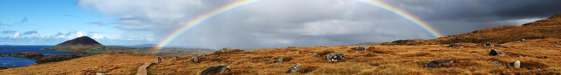 Rainbow over beautiful landscape